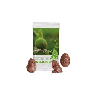 Papieren zakje met fullcolour bedrukking, gevuld met 1 chocolade paasfiguur van ca. 8,5 gr. Figuren in een mix van paashaas, paasei en kuiken