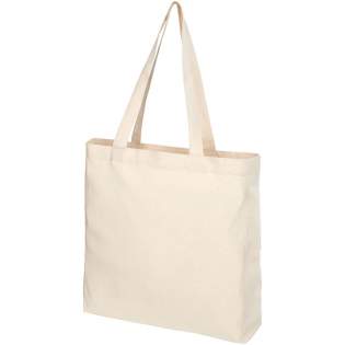 Tote made of 210 g/m² recycled cotton polyester blend. Recycled cotton is manufactured from pre-consumer waste generated by textile factories during the cutting process. Tote with gusset and large main compartment. Features two handles with a dropdow...