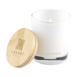 Exclusive Wooosh Sweet Vanilla scented candle cast into a beautifully polished glass jar with a bamboo lid. This candle creates a soothing atmosphere in your home. The scented candle is made from eco-friendly soy wax with 5% aromatic fragrance oil. As soon as the fuse is lit, the wax melts and a delicious, sweet vanilla scent spreads throughout the room. This warm, inviting scent will be appreciated by everyone and fits every season. With 14 burning hours, this luxurious scented candle fits into any interior.  When you light the candle for the first time, let the top layer of wax melt completely. This ensures an even burn and the best possible fragrance experience. The perfect gift for any occasion. Each item is supplied in a luxurious Wooosh gift box.