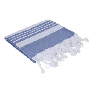 A multifunctional hammam towel from Oxious. Made from 50% OEKO-TEX® certified cotton and 50% recycled industrial textile waste (140 g/m²). Promo is a wonderfully soft and stylish cloth with a white stripe pattern. Beautiful as a shawl, dress on the couch, luxurious (hammam) cloth or towel. The cloth is handmade.  These beautiful, soft cloths are made by local women in a small village in Turkey. They work there in a social context, with room for growth and development. The cloths are handmade with love and care for the environment. Pure enjoyment can begin with a product from the Oxious collection. Optional: Each item supplied in a kraft cardboard envelope and/or with a kraft sleeve.