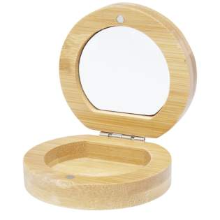 Miroir de poche compact en bambou pour les voyages ou les soins quotidiens de la peau ou le maquillage. Il y a un petit compartiment au bas du miroir pour les petits accessoires. Le bambou utilisé est sélectionné et produit selon des normes durables.