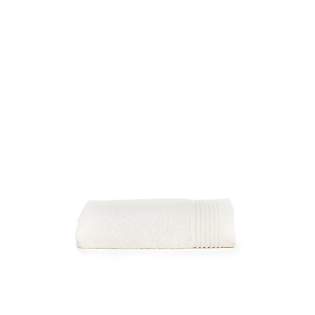 The T1-DELUXE50 Deluxe Towel 50 Ivory Cream of 50 x 100 cm is perfect in the bathroom or in the gym.<br />Enjoy the softness thanks to a fabric thickness of 550 gr/m2.<br />This towel has a high absorption level due to the combed cotton.<br />The hanging loop ensures greater user convenience.<br />Choose from the beautiful colors inspired by Latin America.