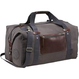 Exclusive design duffel, made of cotton canvas, features a large main compartment and unique Field & Co.™ details. Vinyl accents, front zippered pocket and durable handles. Sides can clip down when you are carrying less, or you can unclip the sides when the bag is fully stuffed. Also features trolley pass-through.