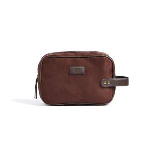 Classic yet modern washbag in suede imitation with details in PU leather. The bag makes it easy for you to store your hygiene items in style, both at home and during travel. The bag comes in a handy size and is easy to carry, thanks to a strap with brass details on the short side.