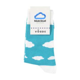 Comfortable socks from Vodde made using a 100% circular economy manufacturing process. These socks are made from collected textiles. The socks consist of 53% recycled cotton (from collected pieces of fabric), 38% recycled polyester (from collected PET bottles), 6% nylon and 3% elastane. Including knitted-in, customised design. All Vodde socks are supplied as standard in pairs with a label, which can be printed in your own full colour design. This way you can design your own socks that perfectly match any corporate identity. These thin quality socks, designed for everyday use, are perfect to combine with a casual outfit.   • Available in sizes M (36-40) and L (41-46). • Minimum order: 100 pairs of socks per size. Minimum order in total: 200 pairs of socks.  • Optional: Supplied in pairs in a (customised) box made from recycled  cardboard - possible from 1,200 pairs of socks.   • By wearing these socks you are contributing to a sustainable world with less pollution. Developed and tested in the Netherlands. Made in the EU.   • The base of the socks is made of recycled yarn and comes in a standard colour. You can choose from 21 standard colours of recycled yarn. Any pattern in the base, cuff, heel and toe can be realised in any colour of your choice.   • The Dutch company Vodde reuses discarded textiles to make new products designed by Dutch designers. Vodde makes its yarn from cotton collected by local 'rag farmers' and from cutting waste from textile production in European countries where Vodde makes its own products. In addition, polyesters derived from PET bottles, nylon, fishing nets and other collected waste are also used.