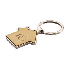 Keyring in the shape of a house. With polished, metal casing and bamboo wooden inlay. Each item is supplied in an individual brown cardboard envelope.