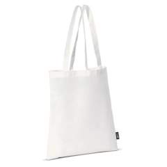 Non-woven white carrier bag with long handles made of light fiber. Different dimensions available with orders from 10.000 pieces.