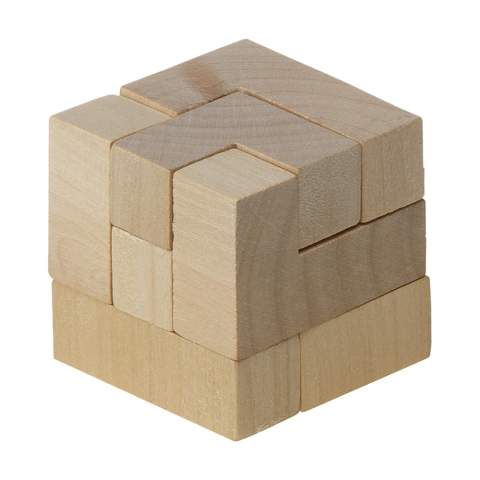 Wooden puzzle (4 x 4 x 4 cm). Incl. instructions. In a cotton bag