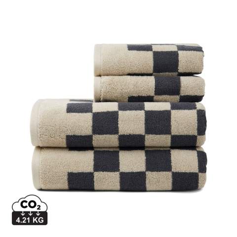 Experience the perfect blend of style, comfort, and absorbency with these exquisite towels. This set offers exceptional softness and functionality. With a plush 500 gsm weight, these towels offer good absorbency and softness. The modern checkerboard pattern adds sophistication to your bathroom decor. The set includes two towels measuring (135x165cm) and two smaller, practical towels measuring (65x40cm). Each set is thoughtfully packaged in FSC®-certified kraft packaging. The Organic Content Standard (OCS) verifies organically grown material and tracks it from source to final product. This product contains 99% OCS certified organic cotton.