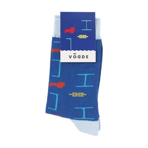 Comfortable socks from Vodde made using a 100% circular economy manufacturing process. These socks are made from collected textiles. The socks consist of 53% recycled cotton (from collected pieces of fabric), 38% recycled polyester (from collected PET bottles), 6% nylon and 3% elastane. Including knitted-in, customised design. All Vodde socks are supplied as standard in pairs with a label, which can be printed in your own full colour design. This way you can design your own socks that perfectly match any corporate identity. These thin quality socks, designed for everyday use, are perfect to combine with a casual outfit.   • Available in sizes M (36-40) and L (41-46). • Minimum order: 100 pairs of socks per size. Minimum order in total: 200 pairs of socks.  • Optional: Supplied in pairs in a (customised) box made from recycled  cardboard - possible from 1,200 pairs of socks.   • By wearing these socks you are contributing to a sustainable world with less pollution. Developed and tested in the Netherlands. Made in the EU.   • The base of the socks is made of recycled yarn and comes in a standard colour. You can choose from 21 standard colours of recycled yarn. Any pattern in the base, cuff, heel and toe can be realised in any colour of your choice.   • The Dutch company Vodde reuses discarded textiles to make new products designed by Dutch designers. Vodde makes its yarn from cotton collected by local 'rag farmers' and from cutting waste from textile production in European countries where Vodde makes its own products. In addition, polyesters derived from PET bottles, nylon, fishing nets and other collected waste are also used.