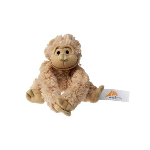 Singe en peluche très douce. Les mains sont pourvues de bandes auto-agrippantes afin d'accrocher cette peluche publicitaire partout.