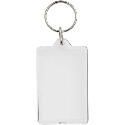 Porte-clés transparent G1 rectangulaire avec anneau fendu en métal. Ce porte-clés s’ouvre à nouveau avec une pièce de monnaie. L’anneau en forme de boucle métallique présente un profil plat idéal pour les envois. Dimensions de l’insert pour impression : 5,0 cm x 3,0 cm.