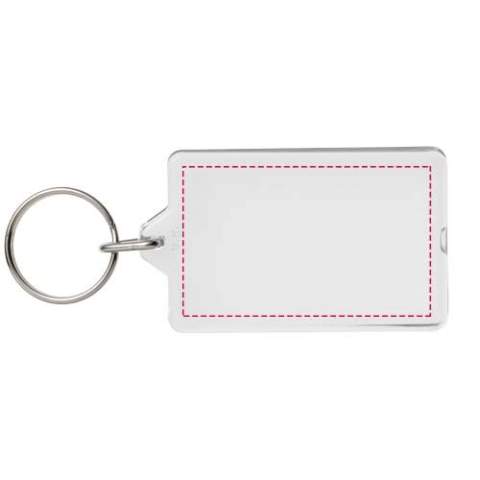 Porte-clés transparent G1 rectangulaire avec anneau fendu en métal. Ce porte-clés s’ouvre à nouveau avec une pièce de monnaie. L’anneau en forme de boucle métallique présente un profil plat idéal pour les envois. Dimensions de l’insert pour impression : 5,0 cm x 3,0 cm.