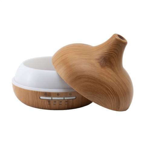 Creëer een rustgevende sfeer in huis of op kantoor met deze Grundig Aroma Diffuser LED. Deze  ABS diffuser met  fraaie houtprint verspreidt geuren en bevochtigt de lucht voor een frisse en ontspannen omgeving. Geschikt voor etherische oliën (niet meegeleverd). Met 7 kleuren LED-verlichting, timer en een waterreservoir met een inhoud van 350 ml. Input 5V/1A Type-C. Inclusief USB-A/USB-C kabel (150 cm) en gebruiksaanwijzing. Per stuk in FSC® gecertificeerde kraftdoos.