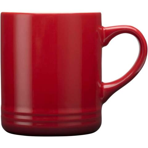 Ceramic mug that features a stylish design with a subtle gradient colour effect. Features a glossy cream coloured interior and a glossy exterior. Dishwasher safe. Presented in a recycled cardboard gift box. Volume capacity: 330 ml.