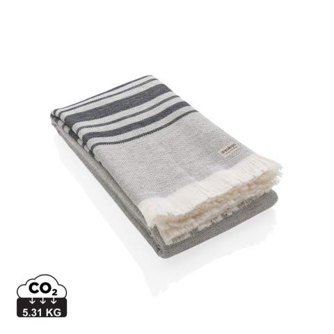 This lightweight, highly absorbent, sand-resistant, and quick dry towel is one of the best sustainable towels out there. Hammam towels are multifunctional: you can also use it as a picnic, baby blanket or as a yoga, beach, and gym towel. Even as a table cloth. Best of all, the thin material makes it ultra-portable and easy to toss in your beach bag, suitcase or over your shoulder. This towel contains 12% recycled cotton and is super soft and silky to the touch. With AWARE™ tracer that validates the genuine use of recycled cotton. 2% of proceeds of each Impact product sold will be donated to Water.org. Made in Portugal.