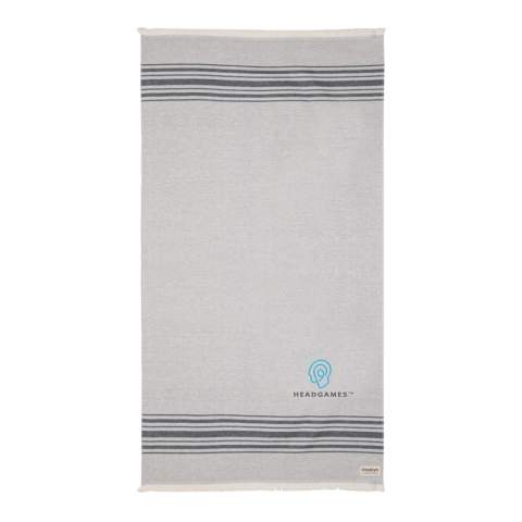 This lightweight, highly absorbent, sand-resistant, and quick dry towel is one of the best sustainable towels out there. Hammam towels are multifunctional: you can also use it as a picnic, baby blanket or as a yoga, beach, and gym towel. Even as a table cloth. Best of all, the thin material makes it ultra-portable and easy to toss in your beach bag, suitcase or over your shoulder. This towel contains 12% recycled cotton and is super soft and silky to the touch. With AWARE™ tracer that validates the genuine use of recycled cotton. 2% of proceeds of each Impact product sold will be donated to Water.org. Made in Portugal.