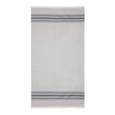 This lightweight, highly absorbent, sand-resistant, and quick dry towel is one of the best sustainable towels out there. Hammam towels are multifunctional: you can also use it as a picnic, baby blanket or as a yoga, beach, and gym towel. Even as a table cloth. Best of all, the thin material makes it ultra-portable and easy to toss in your beach bag, suitcase or over your shoulder. This towel contains 12% recycled cotton and is super soft and silky to the touch. With AWARE™ tracer that validates the genuine use of recycled cotton. 2% of proceeds of each Impact product sold will be donated to Water.org. Made in Portugal.