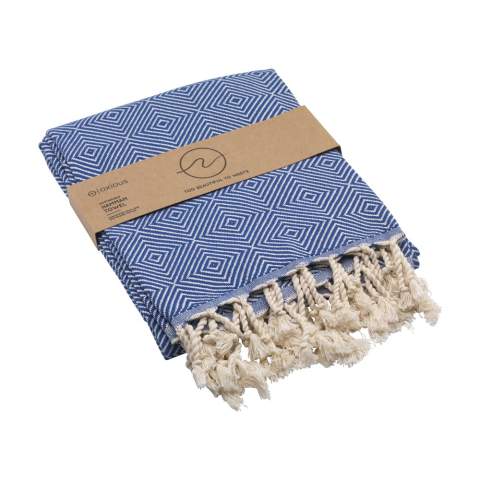 A multifunctional hammam towel from Oxious. Made from 92% OEKO-TEX® certified cotton, 210 g/m², (42% recycled) and 8% RPET. Harmony  is a wonderfully soft and stylish cloth with a cool block pattern. Beautiful as a shawl, dress on the couch, luxurious (hammam) cloth or towel. The cloth is handmade. Harmony  symbolizes harmony between man and nature. With this beautiful canvas the pure enjoyment can begin.  These beautiful, soft cloths are made by local women in a small village in Turkey. They work there in a social context, with room for growth and development. The cloths are handmade with love and care for the environment. Pure enjoyment can begin with a product from the Oxious collection. Optional: Each item supplied in a kraft cardboard box and/or with a kraft sleeve.