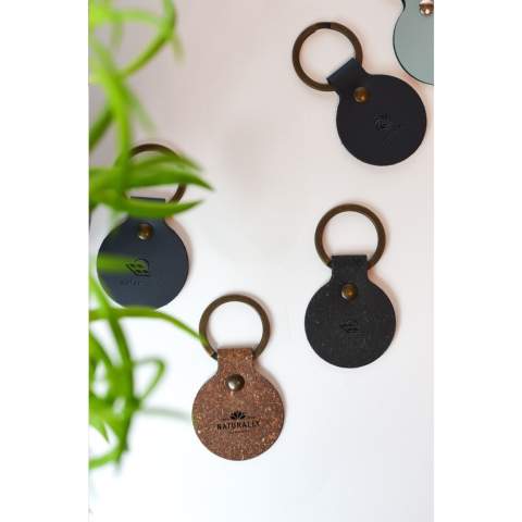 Keychain made from recycled Italian leather waste and natural binders. This product from the MADE out of brand is made from leftover leather pieces from the company's own production. The recycled leather is very sturdy, has a nice matte appearance and smells like leather. The coloured top layer is made from a very thin 100% water-based PU coating. The key chain has a sturdy, metal ring. Handmade. Dutch design. Made in Holland.