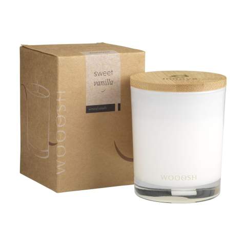 Exclusive Wooosh Sweet Vanilla scented candle cast into a beautifully polished glass jar with a bamboo lid. This candle creates a soothing atmosphere in your home. The scented candle is made from eco-friendly soy wax with 5% aromatic fragrance oil. As soon as the fuse is lit, the wax melts and a delicious, sweet vanilla scent spreads throughout the room. This warm, inviting scent will be appreciated by everyone and fits every season. With 14 burning hours, this luxurious scented candle fits into any interior.  When you light the candle for the first time, let the top layer of wax melt completely. This ensures an even burn and the best possible fragrance experience. The perfect gift for any occasion. Each item is supplied in a luxurious Wooosh gift box.