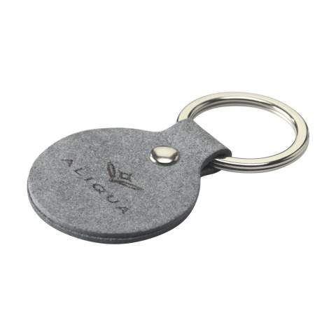 Keyring from the MADE out of brand. This keyring is made from recycled denim fibres: 70% denim waste, 25% binders and 5% vegetable additives. It has a fine, modern-looking texture. Fine fibres make this flexible material comparable to real leather. It is 100% recyclable and can be reused repeatedly. Due to the use of denim waste, mainly from the Netherlands and Germany, this product has a blue colour. Supplied with a sturdy metal keyring. A recyclable product with a contemporary look. Handmade. Dutch design. Made in Holland.