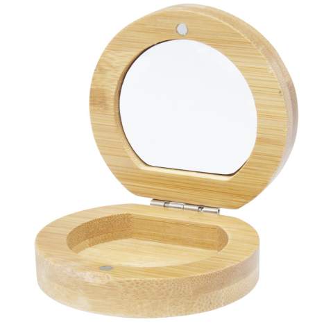 Compact pocket bamboo mirror for travel or daily skincare or makeup use. There is a small compartment at the bottom of the mirror for small accessories. The bamboo used is sourced and produced following sustainable standards.