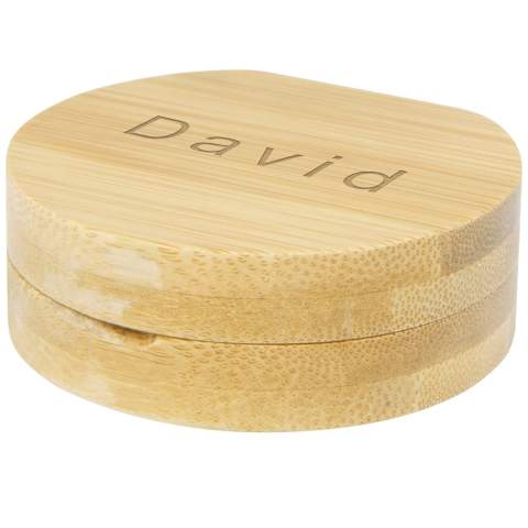 Compact pocket bamboo mirror for travel or daily skincare or makeup use. There is a small compartment at the bottom of the mirror for small accessories. The bamboo used is sourced and produced following sustainable standards.