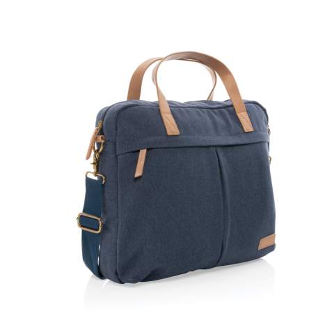 Sacoche pour ordinateur portable 15,6 pouces en toile composé de 60% coton recyclé et 40% polyester recyclé avec doublure en polyester recyclé 150D. Avec de grandes poches avant et arrière pour ranger vos autres objets essentiels. Le traceur AWARE™ qui prouve l'utilisation authentique de la toile recyclée.  2% de chaque vente de produit Impact vendu sera versée en don à Water.org.<br /><br />FitsLaptopTabletSizeInches: 15.6<br />PVC free: true