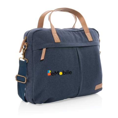 Sacoche pour ordinateur portable 15,6 pouces en toile composé de 60% coton recyclé et 40% polyester recyclé avec doublure en polyester recyclé 150D. Avec de grandes poches avant et arrière pour ranger vos autres objets essentiels. Le traceur AWARE™ qui prouve l'utilisation authentique de la toile recyclée.  2% de chaque vente de produit Impact vendu sera versée en don à Water.org.<br /><br />FitsLaptopTabletSizeInches: 15.6<br />PVC free: true