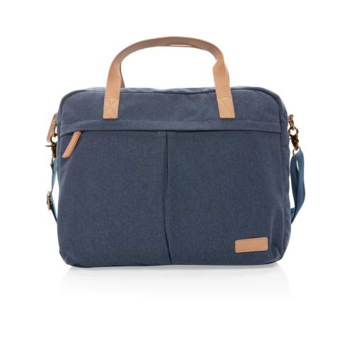 Maak het dagelijkse woon-werkverkeer een beetje makkelijker en een stuk stijlvoller met deze 16oz. laptoptas van gerecycled canvas. Deze tas heeft een gewatteerd 15,6-inch laptopvak en een ruim voor- en achtervak voor je andere dagelijkse benodigdheden. 2% van de opbrengst van elk verkocht Impact-product wordt gedoneerd aan Water.org. Samenstelling 60% gerecycled katoen en 40% gerecycled polyester Voering van 150D gerecycled polyester.<br /><br />FitsLaptopTabletSizeInches: 15.6<br />PVC free: true