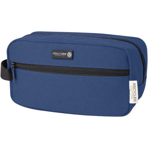 Travel accessory pouch made of GRS certified recycled canvas and GRS certified RPET lining. Featuring a zippered front pocket and one zippered main compartment with organisational pockets, and a comfortable webbing. The decorative metal plate can make a logo shine through its subtle and matt finish. Capacity: 3.5 litres.