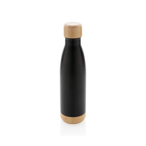 When you're looking forward to your favourite beverage, you can count on this vacuum stainless steel bottle. Whether you're sitting at your desk or taking a walk you can easily take your bottle with you wherever you go. The bottle features a bamboo lid and bottom accent for some extra style. Capacity 520ml.<br /><br />HoursHot: 5<br />HoursCold: 15