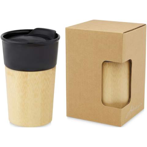 Stylish porcelain mug with organic bamboo exterior which provides a natural look and comfortable grip. The Pereira mug features a push-on spill-proof slide-lock lid and is BPA Free. Volume capacity is 320 ml. Handwash recommended. Presented in a recycled cardboard gift box.