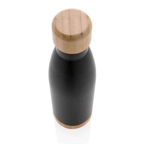 When you're looking forward to your favourite beverage, you can count on this vacuum stainless steel bottle. Whether you're sitting at your desk or taking a walk you can easily take your bottle with you wherever you go. The bottle features a bamboo lid and bottom accent for some extra style. Capacity 520ml.<br /><br />HoursHot: 5<br />HoursCold: 15