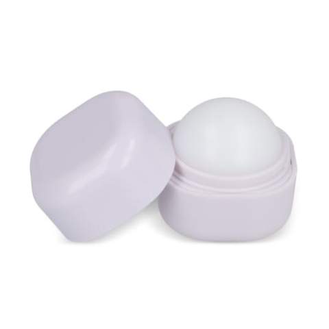 Lip balm in a cube-shaped container made from recycled ABS. The rounded ball shape inside provides smooth application for moisturizing care.