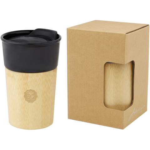 Stylish porcelain mug with organic bamboo exterior which provides a natural look and comfortable grip. The Pereira mug features a push-on spill-proof slide-lock lid and is BPA Free. Volume capacity is 320 ml. Handwash recommended. Presented in a recycled cardboard gift box.