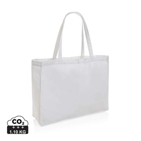 Tell a true story about sustainability and wear it with pride! Carry all your essentials in this functional recycled 145 gsm cotton tote bag. The tote bag features a 14cm gusset for extra storage and is embedded with AWARE™ tracer technology. With AWARE™, the use of genuine recycled fabric materials (70% rcotton/30% rpet) and water reduction impact claims are guaranteed. Save water and use genuine recycled fabrics. If you choose this item you save 860 litres of water. With the focus on water, 2% of proceeds of each Impact product sold will be donated to Water.org. Water savings are based on figures when compared to conventional fibre. This calculated indication is based on reliable LCA data as published by Textile Exchange in their Material Snapshots 2016.<br /><br />PVC free: true