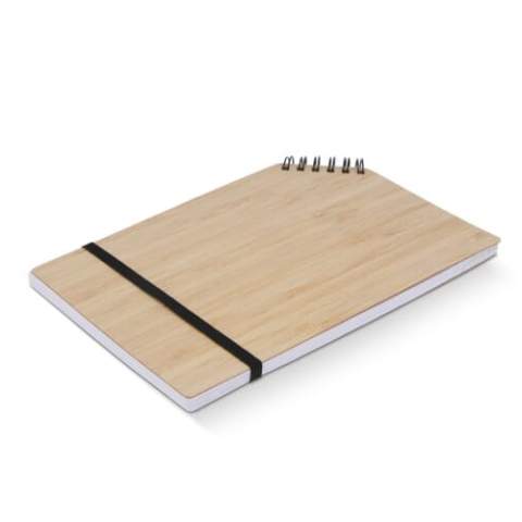 Elevate your note-taking with our A5 Bamboo Corner-Bound Notebook. This eco-friendly masterpiece is meticulously crafted from sustainable bamboo and features a unique corner binding for added style.