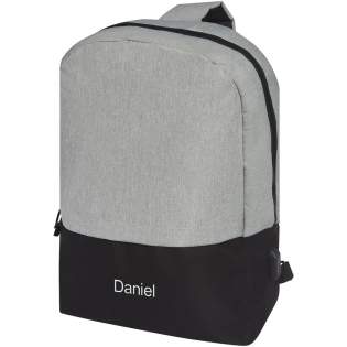 Mono shoulder strap backpack designed with heathered colour effect in the front panel and black colour in the back panel. Features a large zippered main compartment with a padded 15.6" laptop sleeve. Comes with USB port including USB-A cable with 1 male and 1 female connector. The shoulder strap can be attached on the left or right bottom corner of the bag. There may be minor variations in the colour of the actual product due to the nature of the fabric dyes, weaves, and printing.