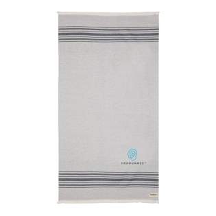 This lightweight, highly absorbent, sand-resistant, and quick dry towel is one of the best sustainable towels out there. Hammam towels are multifunctional: you can also use it as a picnic, baby blanket or as a yoga, beach, and gym towel. Even as a table cloth. Best of all, the thin material makes it ultra-portable and easy to toss in your beach bag, suitcase or over your shoulder. It's made from 88% OEKO-TEX-certified cotton (No harmful substances or dyes are used during the manufacturing process.) and 12% recycled cotton that's super soft and silky to the touch. With AWARE™ tracer that validates the genuine use of recycled cotton.  Each towel saves 597,8 litres of water. 2% of proceeds of each Impact product sold will be donated to Water.org. Made in Portugal.